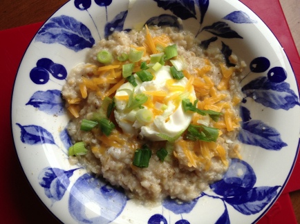 Savoury oatmeal. This version with a soft-poached egg, grated cheddar and green onions. My new favourite breakfast, still.