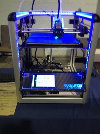 3-D printer in action - one of the larger and fancier models on display.